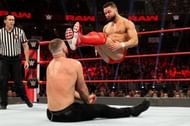 Finn Balor and Dean Ambrose facing off on Raw